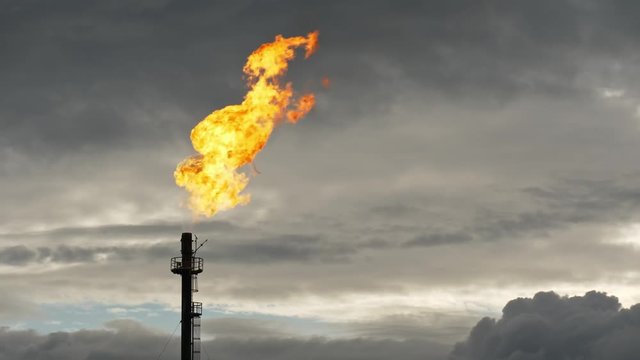 gas torch at dusk