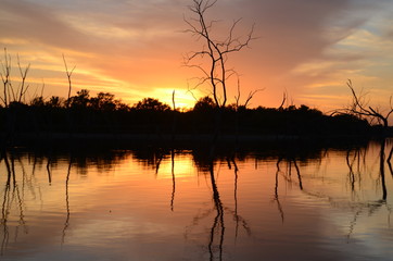 Fototapeta na wymiar Cliche Sunset on the Lake