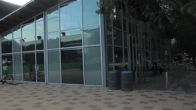 A tilt shot of a glass building.
