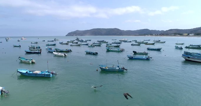 Puerto Lopez, Ecuador / September 13, 2018 - Drone Aerial - Flying Out to Anchored Boats