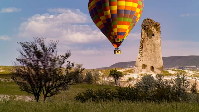 Cinemagraph of hot air balloons rising over a karst in Cappadocia, Turkey.