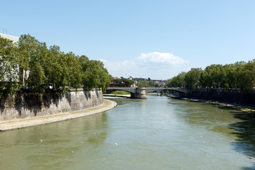View up the Tiber River, Rome, Italy in horizontal orientation with copy space for text