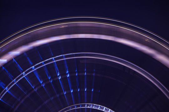 long exposure ferris wheel on the night sky background, close-up - Powered by Adobe