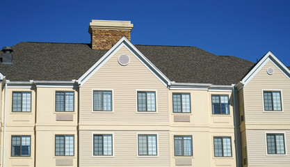 Fototapeta na wymiar modern rental apartment buildings in sunny day