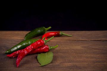 chili red on a dark wooden background
