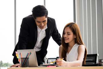 Asian Businesspeople are working together at the office.