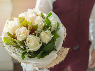 Groom with Bouquet White Rose