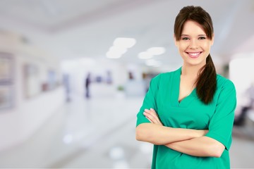 Young nurse woman with stethoscope at hospital