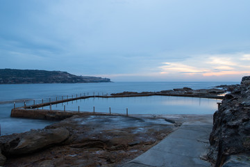Malabar rock pool in a cloudy overcast day.