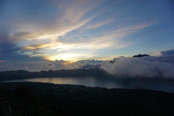 Naklejka na ściany i meble Beautiful sunrise from the top of Mount Batur - Bali, Indonesia