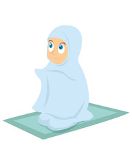 A young muslim girl praying