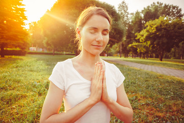 girl doing yoga outdoors