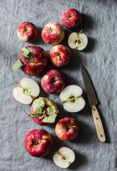 Fresh ripe organic red apples on grey background, top view. Flat lay, copy space