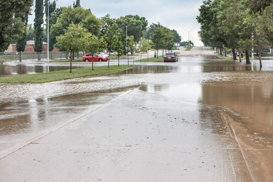 Stormwater flooding over the streets with stalled cars