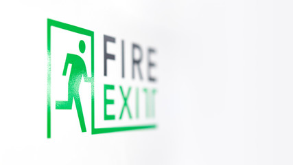 man icon run to fire exit, green and grey signage on white wall