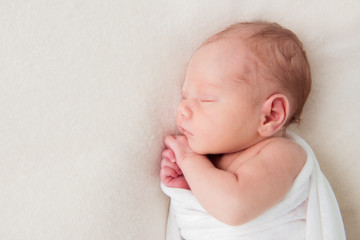 Cute newborn baby sleeping on white background. Top view © irena_geo