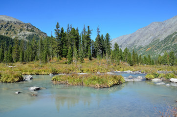 Russia, mountain Altai, river Multa flows from the lower Multinskoe lake