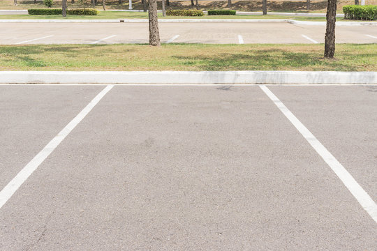 Empty Space in a Parking Lot / Empty space parking lot outdoor in public park.