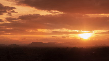 Scenery sunrise or sunset silhouette view and sunlight  with mountain background on a morning time at thailand