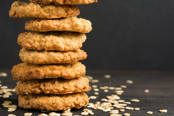 Homemade oatmeal cookies on wooden table with copy space
