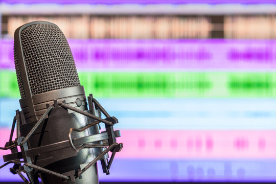 studio condenser microphone on waveform background, recording concept