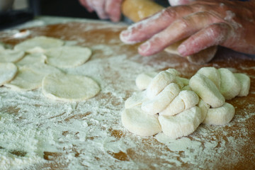 Home-made recipe for dumplings (raviol)i. Traditionally, women of the older generation mold the dumplings in the family.