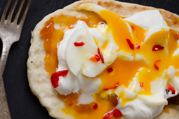 Egg and mango chutney flatbreads. WITH A KICK OF FRESH CHILLI. Selective focus