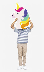 Little boy holding a unicorn icon