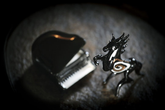 Black horse piano dark background 