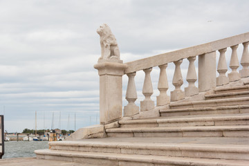 Fototapeta premium Chioggia, Italy-August 26, 2018: Province of Venice. monument on the city street.