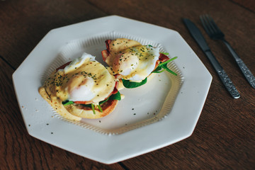fried egg on a plate with salad