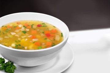 Vegetable soup isolated on a white background