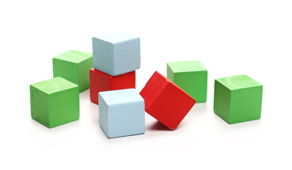 Wooden building blocks for children, isolated on white background 