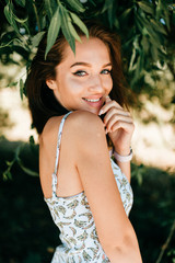 Closeup emotional  lifestyle portrait of adorable cute beautiful young cheerful coquette girl with...
