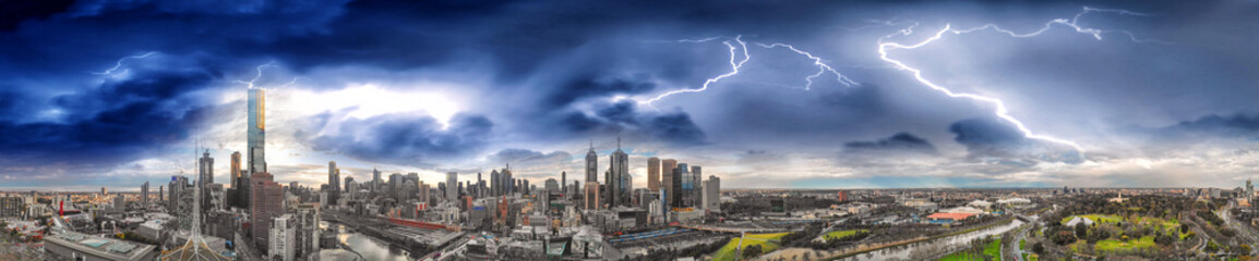 Melbourne, Australia. Sunset aerial panorama of city skyline during a storm