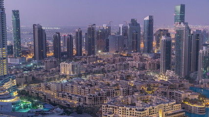 Dubai downtown night to day timelapse. Top view from above