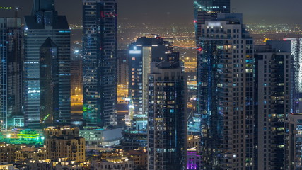 Fototapeta na wymiar Dubai downtown night timelapse. Top view from above