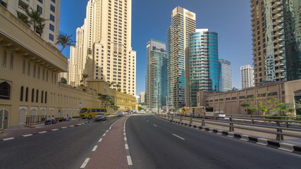 Fototapeta na wymiar A view of traffic on the street at Jumeirah Beach Residence and Dubai marina timelapse hyperlapse, United Arab Emirates.