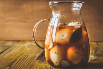 Pickled eggs in the glass jug