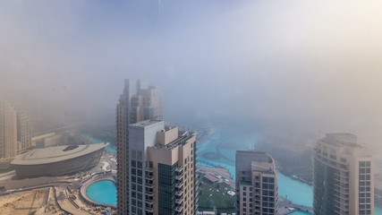 Foggy morning in downtown of Dubai timelapse.