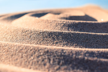 Hintergrund Textur Spirale im Sand von der Seite mit Licht und Schatten und Schärfe Unschärfe...