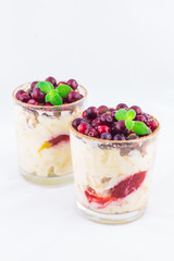 Dessert with cream and cranberries	
