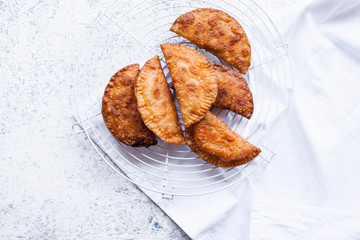 Empanada breadcrumb fried turnovers, pie, panzerotti street food