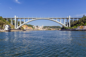 Fototapeta premium Ponte da Arrabida Bridge in Porto or Oporto city, Portugal. Connects the cities of Porto or Oporto and Vila Nova de Gaia over the Douro River