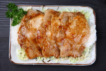 Pork fried with ginger on rice