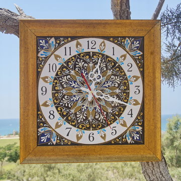 brown square hand-painted watch with contour acrylic paints