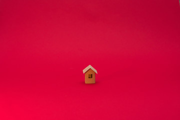 Obraz na płótnie Canvas Paper Home, red background with copy space, for advertising, close up