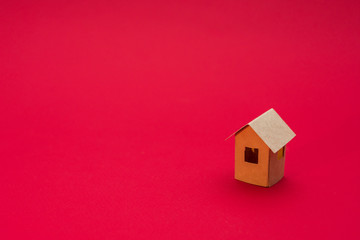 Paper Home, red background with copy space, for advertising, close up
