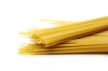 Spaghetti, yellow pasta isolated on white background 