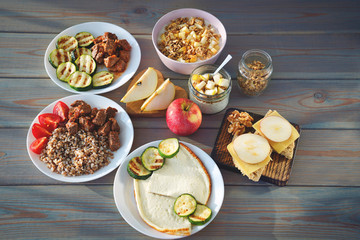 Health Fitness Food in lunch boxes. Set meal for the whole day.